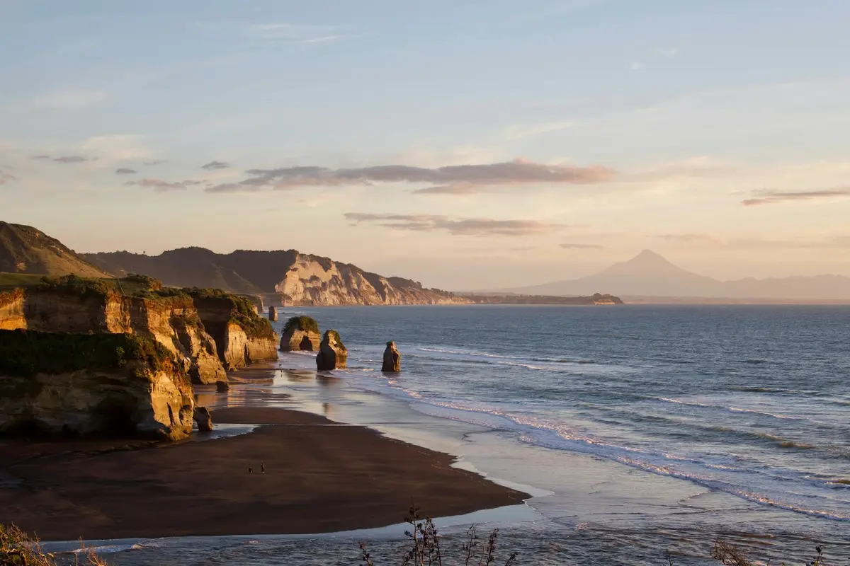 The Three Sisters coastline in Taranaki at sunset