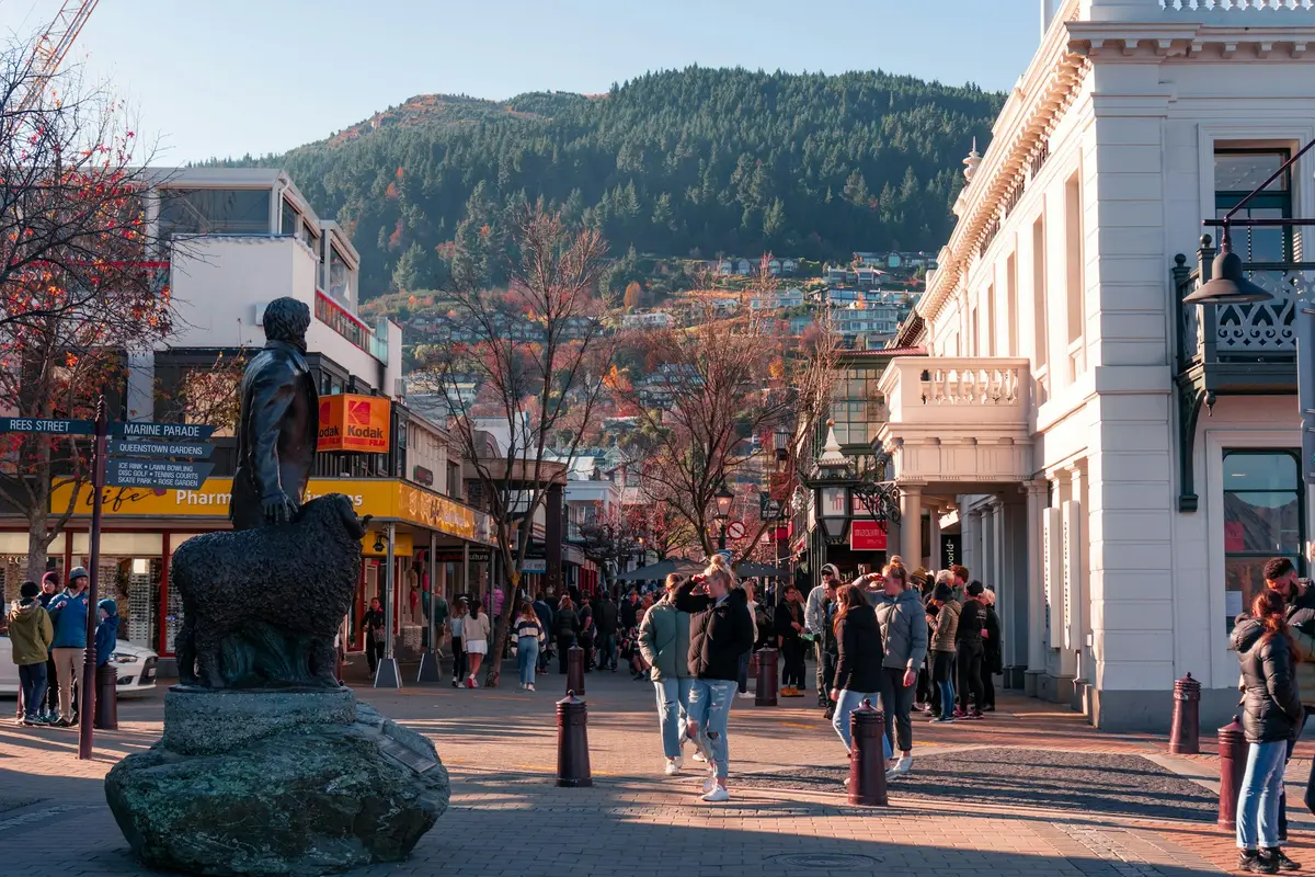 People walking along a street in Queenstown