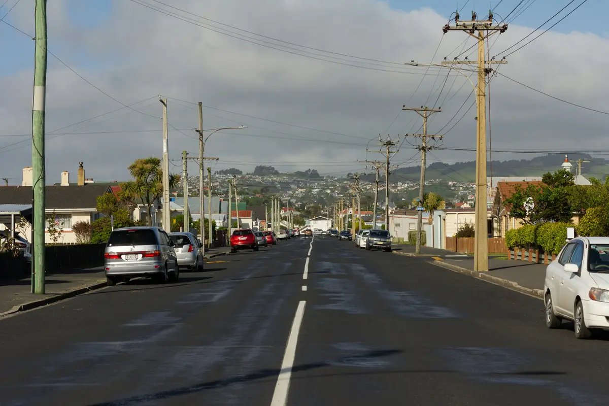 Street with parked cars in St Kilda, Dunedin