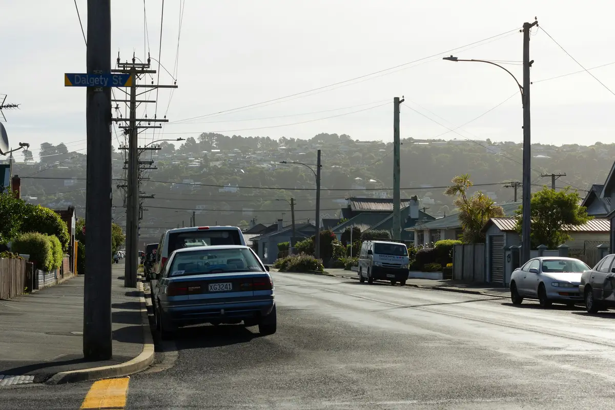 Parked cars on a street in St Kilda, Dunedin