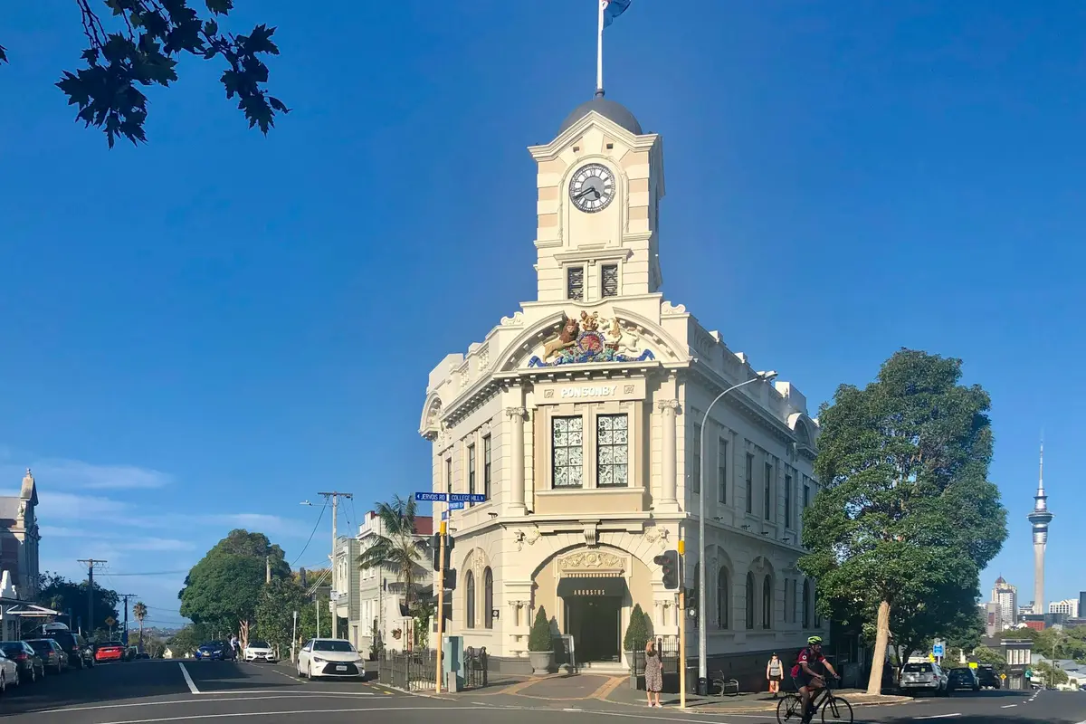Heritage white building against a blue sky in Auckland