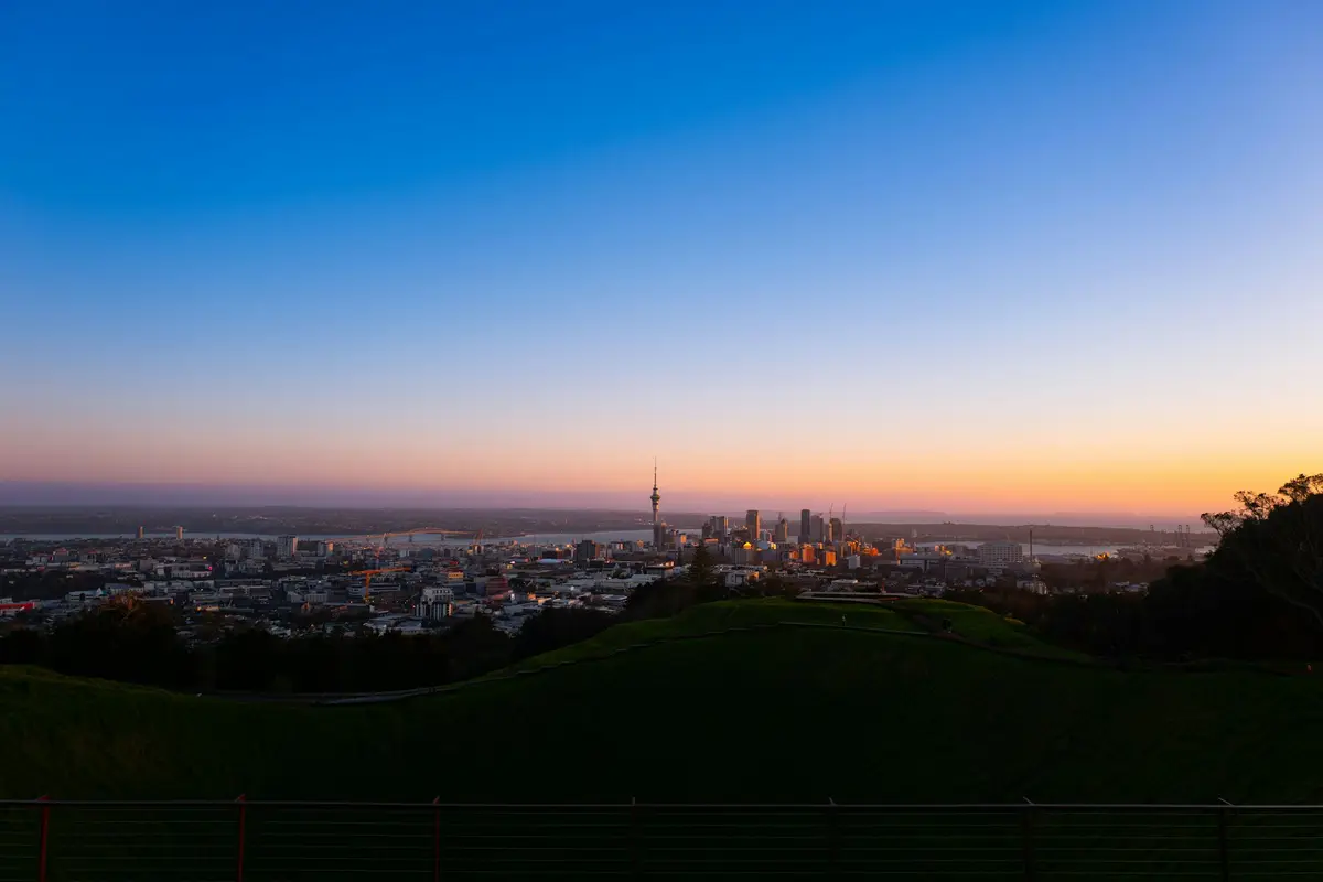 Auckland city skyline against a twilight sky