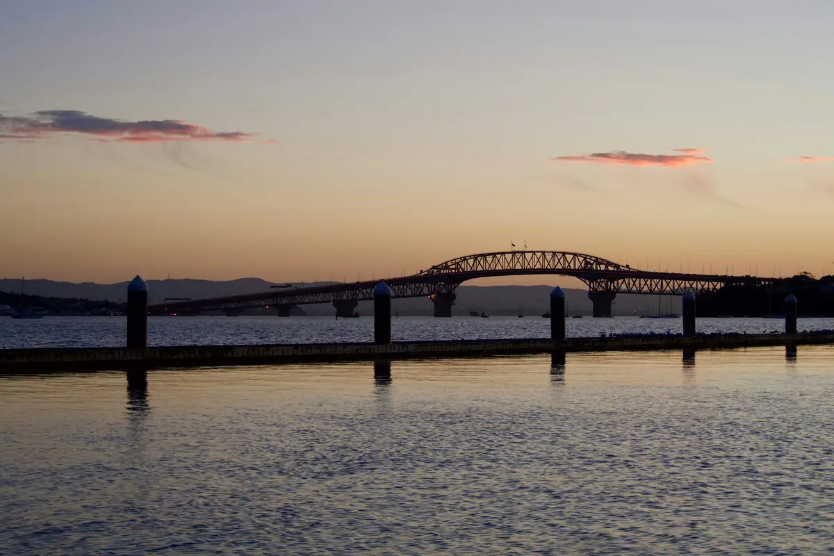 The Auckland Harbour Bridge at sunset